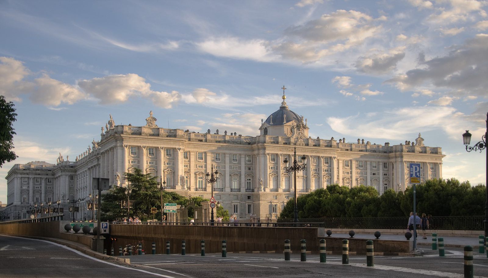 The Royal Palace of Madrid under a blue sky.