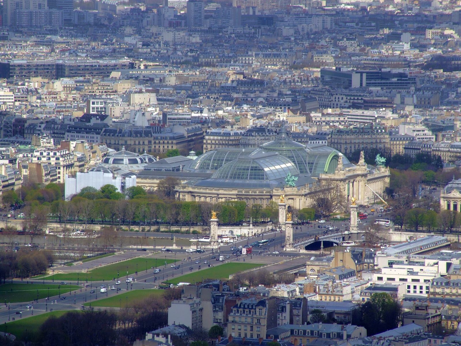 The glass roof of the Grand Palais and the Pont Alexandre III, seen from above.