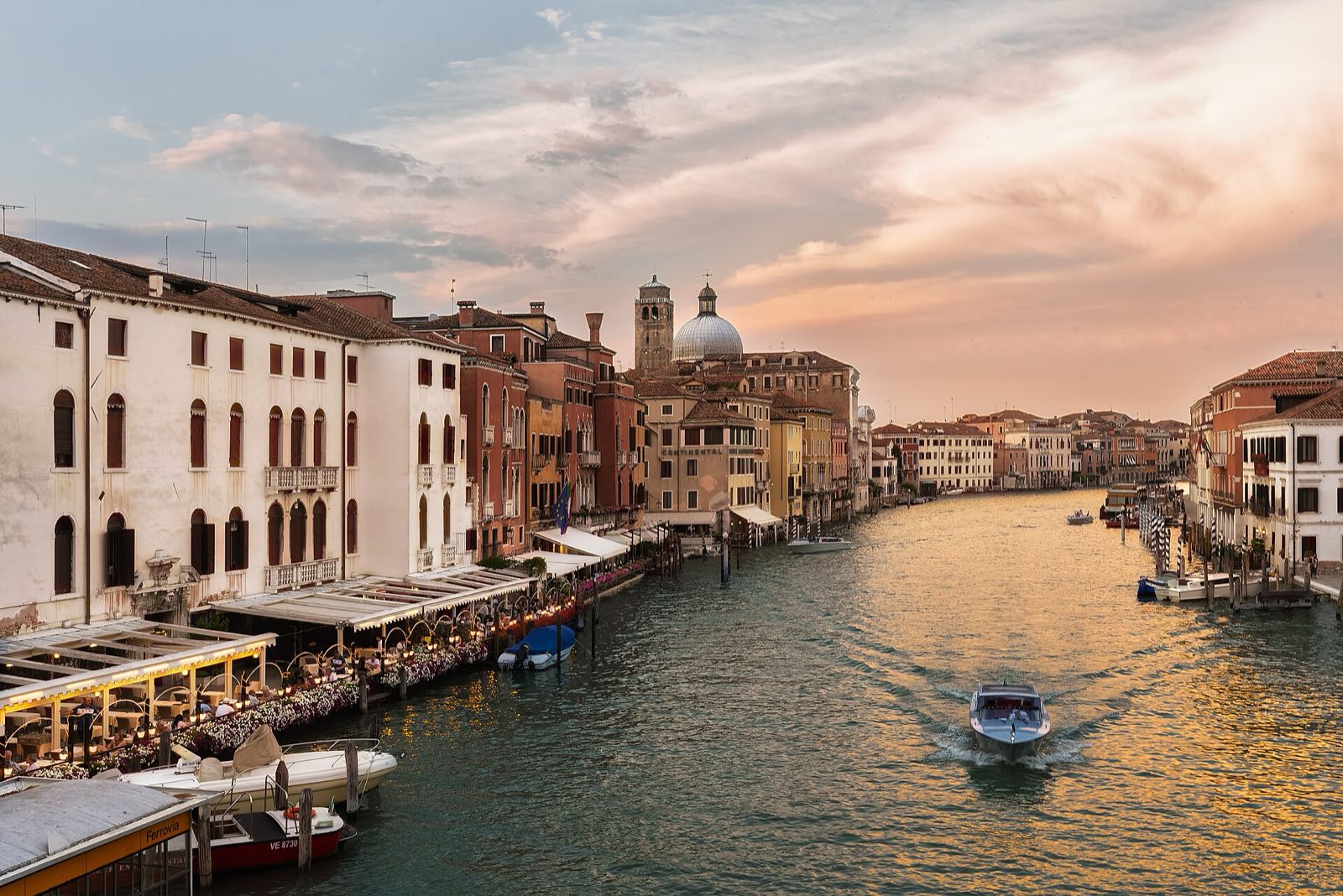 The Grand Canal in Venice, lined with palaces, in the evening light.